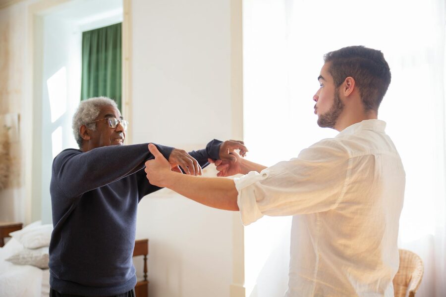 An older couple receiving attentive care at home